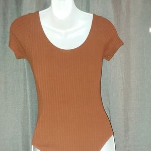 An Heart in Hips button down bodysuit